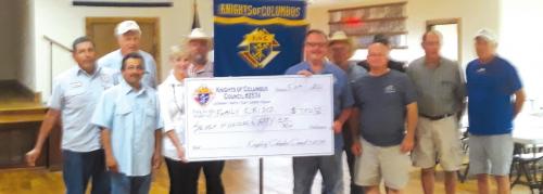 KCs Donate to Family Crisis Center