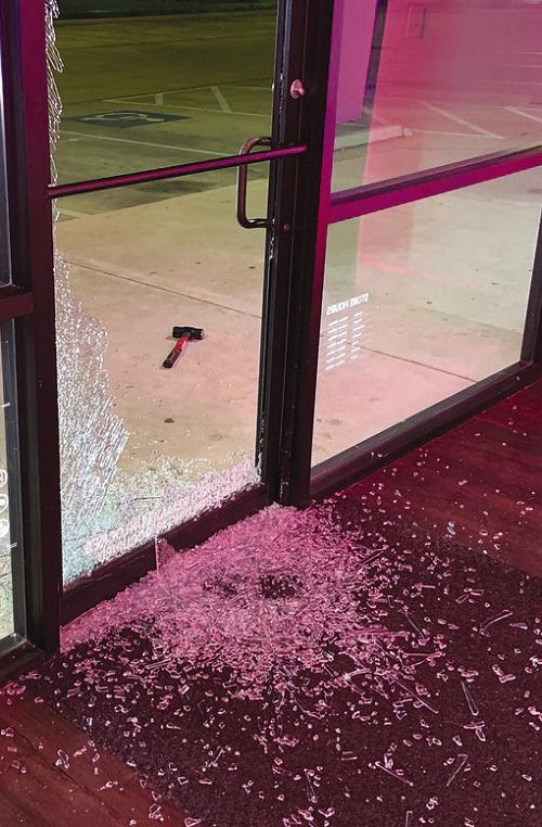 Police found a hammer that was used to break the glass near the store entrance.