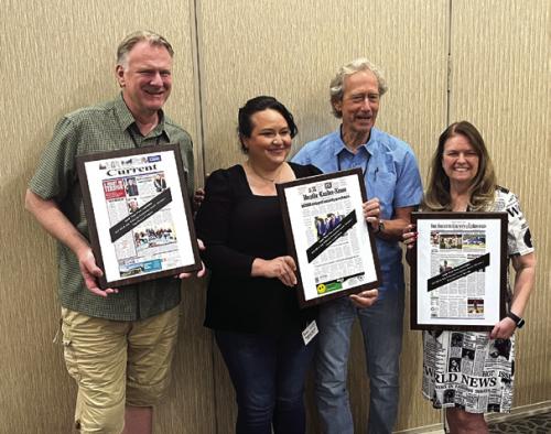 Sweepstakes winners in the South Texas Press Association’s annual newspaper contest, awarded Friday in New Braunfels – Left to right: Marc Robertson of the Frio Nueces Current in the small weekly division, Meghann Garcia and Craig Garnett of The Uvalde Leader-News in the large weekly division, and Regina Keilers of The Fayette County Record in the semi-weekly division.