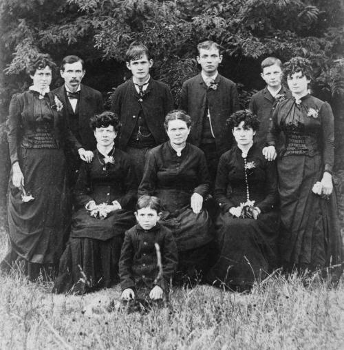 The Louis and Mary (Loessin) Luck Family photographed by G. A. Pannewitz in the mid-1880s. Charles P. Luck, standing second from right. Photo courtesy of the Fayette Heritage Museum and Archives