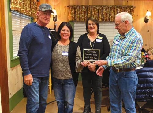 Carmine Chamber of Commerce mixer and awards dinner was held Feb. 28 at JW’s Steakhouse Event Center, before the COVID-19 pandemic. Volunteers of the Year are Bob and Phyllis Stegen. Also pictured are Chamber President Marlene Waak and presenter James Press. Photo by Valerie Moore