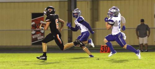 Schulenburg sophomore running back John Davis breaks free for a long run Friday.