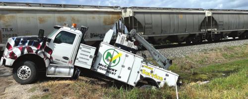Train Strikes Truck, Two Injured