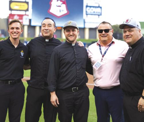 Fr. Brian Phillips, the former priest at Sacred Heart in La Grange and now at St. Margaret Mary Catholic Church, threw out the first pitch at the Round Rock Express minor league baseball game Friday as Catholics from across the Diocese of Austin gathered for an evening of baseball, fellowship, and fun.