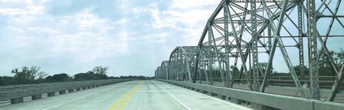 After years of construction, the new Business Highway 71 Bridge in La Grange was opened Monday. It sits next to the old one, right, which will be rehabbed and put back in use for one-way traffic.