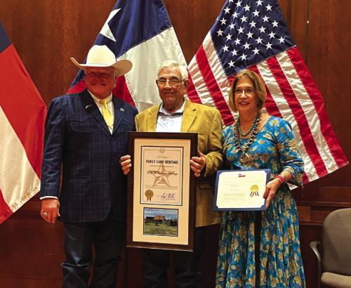 Sid Miller, Texas Agriculture Commissioner, along with Michael and Marilyn Melnar at the Texas Family Land Heritage Program in Austin.
