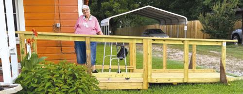 Senior Connections member Cynthia Meyer is pictured here with her new ramp by Texas Ramp Project of Fayette County. A representative from the organization held a presentation for Senior Connections and within a months time she was safely getting in and out of her home.