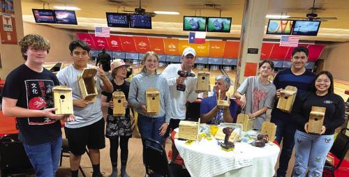 The La Grange Leo club would like to thank Tenth Frame in Schulenburg for hosting their year end party. After receiving their service awards and a fun game of bowling Leos and Lions constructed bird nesting boxes to be donated to the City of La Grange for Hope Hill Park.