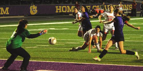 La Grange’s Megan Davis takes this shot in Tuesday’s match against Smithville. Davis scored two of the Lady Leps’ goals. Photos by Jeff Wick