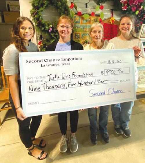 Pictured from left is: Destiny Psencik, Turtle Wing Foundation Executive Director; Nancy Hajek, Second Chance Emporium Church Coordinator; Gayle Schielack, Second Chance Emporium Store Director; and Julia Thomas, Second Chance Emporium Assistant Store Director.