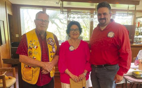 The La Grange Noon Lions welcome their newest member, Sarah Marrou (center). Sarah told the crowd that her mother was a Lions piano player for many years and she is very proud to be a part of a service organization with so much goodwill and history. Pictured with her are Admiral Weldon Koenig (left), her Lions Sponsor, and Craig Moreau (right), La Grange Noon Lions President.