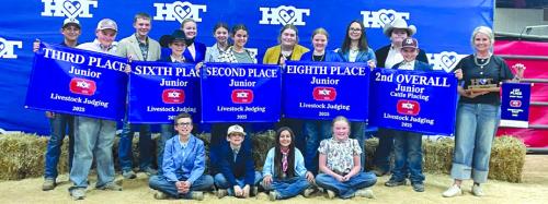 Pictured from from left, sitting: Tate Fritsch, Rowdy Guenther, Emma Zwescpher and Abigale McBride; back row: Dylan Zwescpher, Abraham McBride, Holden Holub, Crockett Guenther, Julia Melton, Laramie Laake, Adalyn Carrales, Rheagan Karisch, Kaisley Janecka, Tatum Fritsch, Rilan Karisch, Hudson Holub, and Coach Kaci Carrales.