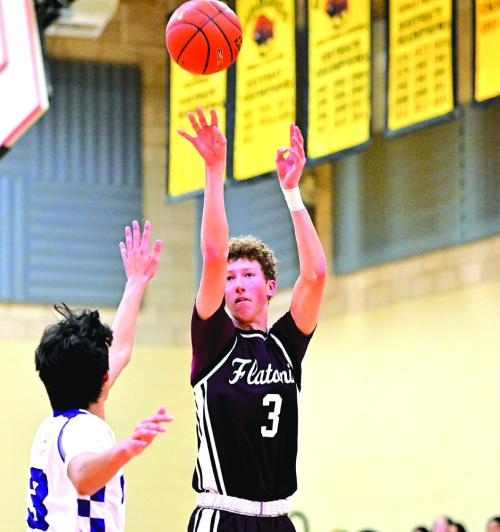 Camden Bosl puts up a three-pointer for the Flatonia Bulldogs in their bidistrict playoff win Monday night. Flatonia defeated Thrall 89-56. Photo by Stephanie Steinhauser