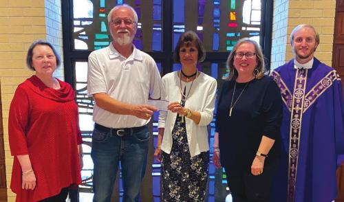 KJZT Society Donates to AMEN
