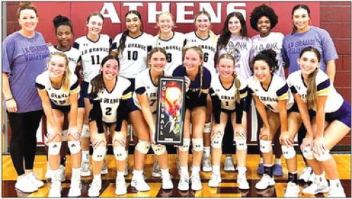 The members of the La Grange volleyball team show off their trophy for winning the Silver Bracket title at the Athens tournament over the weekend.