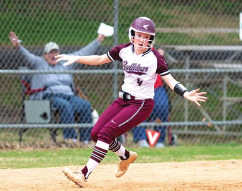 Lady Dogs Drop District Opener