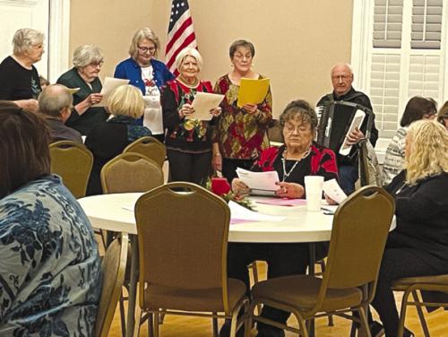 Czech Heritage Society members and guests singing Czech songs.