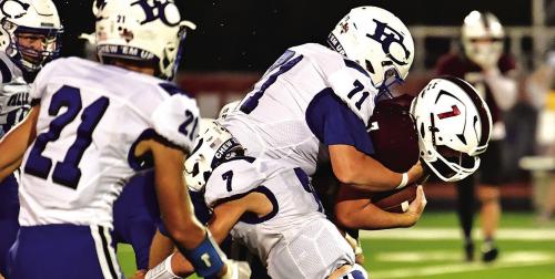 Dayton Cliffe pushes through to pick up the first down for the Flatonia Bulldogs Friday night against Falls City. Photo by Stephanie Steinhauser