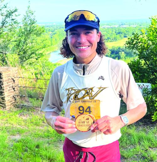 Aaron Albert of Houston won the Spasslauf 5K that kicked off the Schuetzenfest festivities May 16 in La Grange. This was his first time running in the La Grange race. He ran the challenging course, which started at the KC Hall in La Grange and then went past the Colorado River, Bucker’s Creek and around the golf course before going up the bluff, in a time of 17:16. Photo by Jeff Wick
