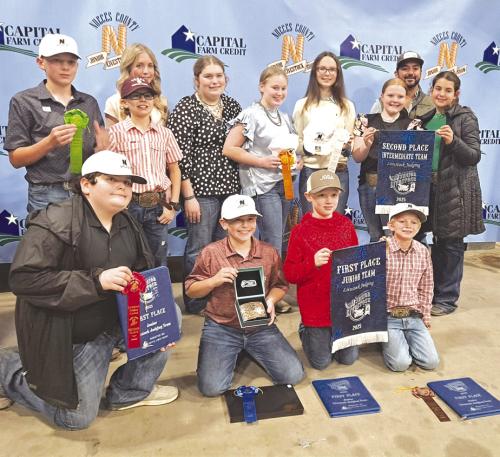 Pictured front from left: Rilan Karisch, Hudson Holub, Jehnsen Janecka, and Joe Carrales; back row: Holden Holub, Tate Fritsch, Hailey Janish, Rheagan Karisch, Julie Melton, Tatum Fritsch, Kaisley Janecka, Coach JoJo Carrales, and Adalyn Carrales.