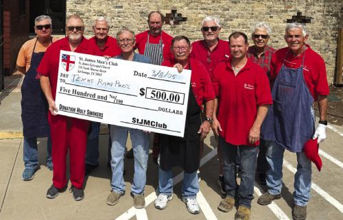 The St. James Holy Smokers recently cooked for The Texas Ramp Project. Pictured from left are Jimmy Klyng, Frank Smith (Regional Coordinator, Tri-County, Texas Ramp Project) Guy Mason, Paul Cheatham, Larry Kahanek, Chuck Gibson, Joe Bailey, Jason Krupala, Dan Boyles, and Jim Gilley.