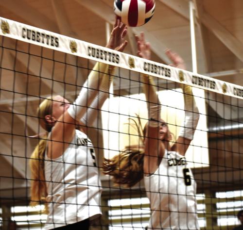 Round Top-Carmine’s Hayden Kasmiersky and Caydan Nelius jump to block a ball in Tuesday’s victory over Brazos Valley. Photo by Paul Kipp