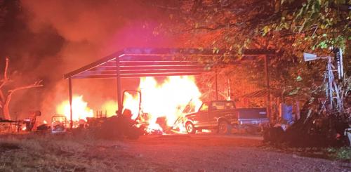 This fire Saturday on Camp Lone Star Road was sparked by a brush fire left unattended.