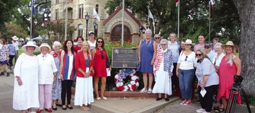 Local members of the Daughters of the American Revolution pose with the marker after it was unveiled Saturday at the Veterans Memorial on the courthouse lawn in La Grange. Photo by Jeff Wick
