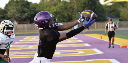 La Grange’s Dillan Johnson reaches out to haul in this touchdown pass during Thursday’s preseason scrimmage against Franklin at Leopard Stadium. Photo by Darrell D. Gest