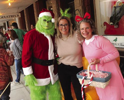 Lots of business owners got into the fun of the fest, like here in front of Julie B. Photos by Jeff Wick