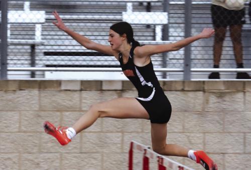Schulenburg’s Eva Faith competes in the 100 meter hurdles at the Columbus meet. She was 4th. Photos by Audrey Kristynik