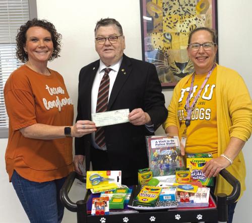 The Lafayette Lodge recently held an event on the La Grange Square on the first Saturday in August and asked the community to donate school supplies or make a cash donation to the event. Above, Jackie Skelton with Lafayette Lodge presented the monetary donation and items collected to La Grange Elementary Principal Dr. Regina Walker (left) and La Grange Elementary Librarian Amy McCord (right). Photos from the event below.