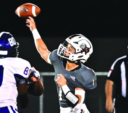 Flatonia Senior quarterback Cale Janecka connects with Keegan Green for a touchdown to bring the Bulldogs into a tie before the half Friday. 400 S. Colorado St. Flatonia Photo by Stephanie Steinhauser