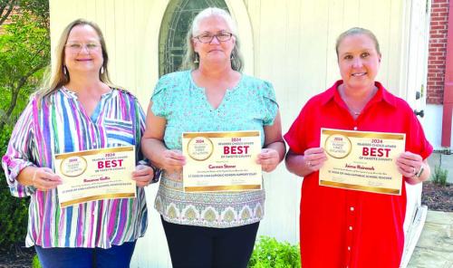 Pictured from left: Rosanne Gallia, named the best St. Rose of Lima Catholic School Administrator; Carmen Stoner, named the best St. Rose of Lima Catholic School Support Staff; and Jaime Rainosek, named the best St. Rose of Lima Catholic School Teacher.