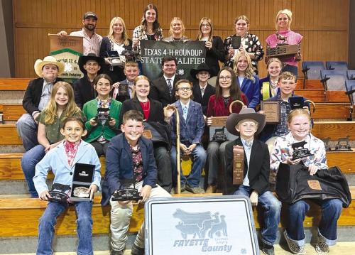 Front from left: Emma Zweschper, Hudson Holub, Joesph Carrales, Abigale McBride; second row: Hayleigh Pizzitola, Adalyn Carrales, Kaisley Janecka, Tate Fritsch, Tatum Fritsch, Holden Holub; third row: Rilan Karisch, Dylan Zweschper, Abraham McBride, Logan Poncik, Crockett Guenther, Hailey Janish, Julia Melton; back row: Coach JoJo Carrales, Keeley Warnken, Madyson Holub, Haley Schramek, Kyrroll Prihoda, Rheagan Karisch and Coach Kaci.
