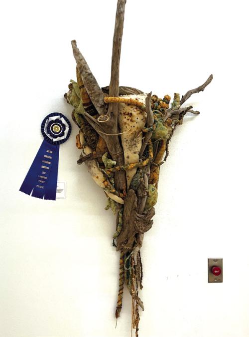 Stephanie Shroyer’s fiber and found materials sculpture titled “Tornado.”