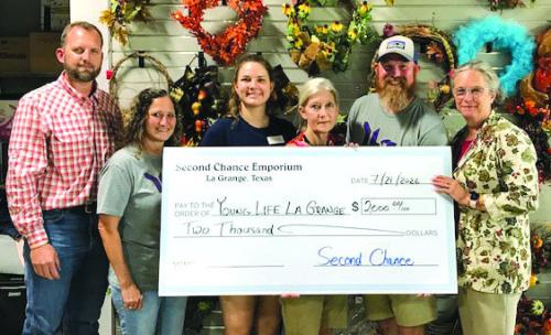 Second Chance Emporium recently donated $2,000 to Young Life of La Grange. Young Life’s mission is to introduce adolescents to religion and help them grow in their faith. Pictured from left to right: Kevin Ulrich, Young Life committee member; Laurie Krupala, Young Life donor chair; Julia Thomas, Second Chance Emporium asst. store director; Gayle Schielack, Second Chance Emporium store director; Tim Scarborough, Young Life Committee chair and Annette Cooper, Young Life committee member.