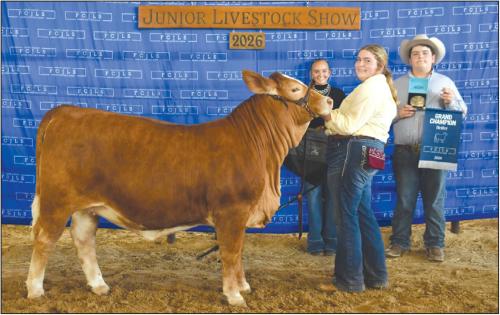 Grand Champion Heifer - Rheagan Karisch, Pure Country 4-H; Grand Champion Buckle Sponsor - KPK Manufacturing. Reisy Janea pictured holding bag and Rilan Karisch holding buckle and banner.