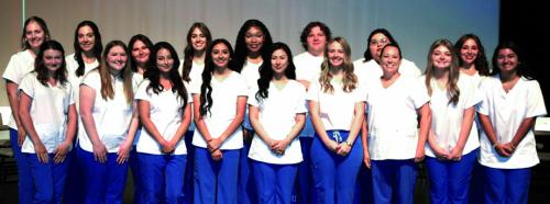 Seventeen graduates of the Blinn College District Vocational Nursing Program were honored at a pinning ceremony Thursday. Graduates are (front, from left) Brooke Olszewski, Emily Oldham, Alma Vergara, Wendy Orocio, Lauren Hernandez, Jaeden Kuck, Lola Warren, Emily Lewis, and Haley Wood; and (back, from left) Tatum Self, Skylar Buth, Holly Oldham, Sophia Willis, Chelsea Soanes, Hayden Splawn, Angela Lopez, and Breanna Fonseca.