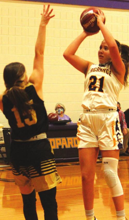 La Grange’s Maddi Fritz shoots over a Giddings player in Wednesday’s victory. Photo by Jeff Wick