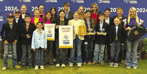 Pictured front from left: Tate Fritsch, Abraham McBride, Hudson Holub, Kinley Kutac, Emma Zweschper, Adalyn Carrales, Alexis Berckenhoff, Kaisley Janecka, Laramie Laake, Crockett Guenther, Abigale McBride and Coach Kaci Carrales; back row: Julia Melton, Tatum Fritsch, Addison Berckenhoff, Kullen Kutac, Peyton Gilchrest, and Hailey Janish.