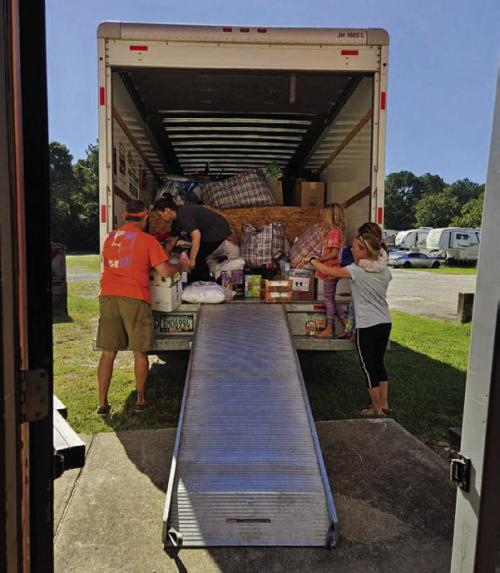 Volunteers unload the U-Haul in Georgia.