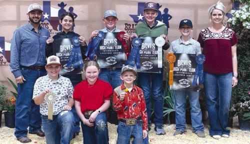 Front row: Hudson Holub, Abigale McBride, and Joe Carrales Back Row: Coach JoJo Carrales, Adalyn Carrales, Abraham McBride, Holden Holub, Crockett Guenther, and Coach Kaci Carrales.