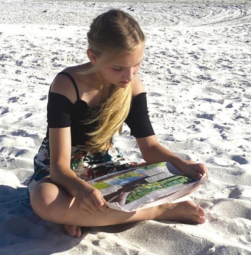 Brylee Brugger took the Smartypants section of The Fayette County Record on vacation. She is sitting at the mouth of the Caloosahatchie River at Fort Myers Beach in Florida. Brylee will be in the 7th grade at La Grange Middle School and is the daughter of Chris and Laura Brugger and granddaughter of Mike and Maxine Brugger and Lucille Koehl and the late Emil Koehl.