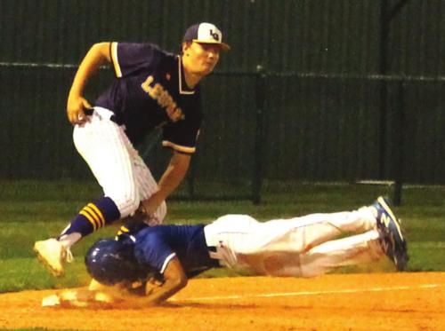 La Grange’s third baseman Trenton Barnes makes a tag Tuesday to get this Manor New Tech player out as he tried to stretch a double into a triple . Photo by Jeff Wick