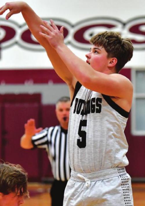 Dayton Cliffe hits a three point shot for the Flatonia Bulldogs in Tuesday night’s win over Schulenburg. Photo by Stephanie Steinhauser