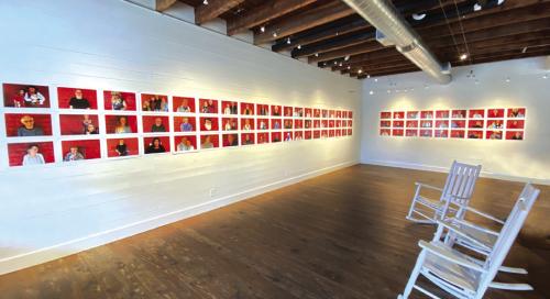 Red Wall Portraits hanging in the Red &amp; White Gallery.