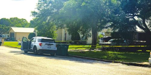 Crime scene tape surrounded a house on Northpointe Ave. while a La Grange Police Officer guarded the perimeter Saturday morning, June 14.