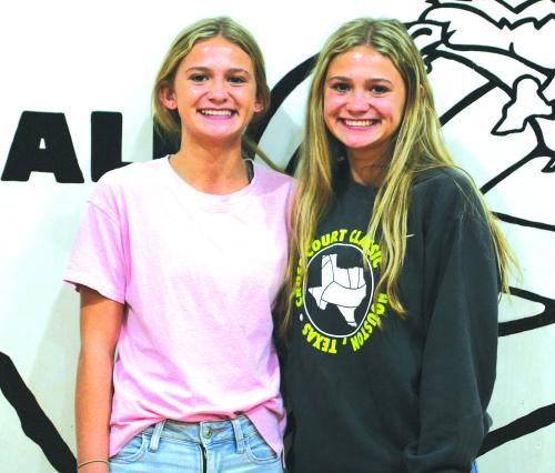 Tess Eilers (left), Jill Eilers (right) are twins and key players in the Round Top-Carmine volleyball team. Photo by Brian Pierson