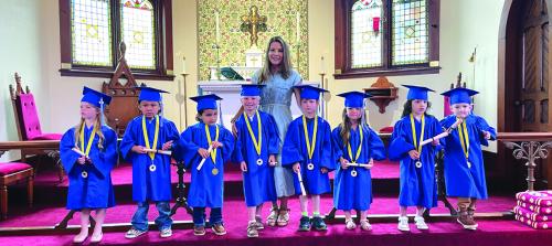 St. James Episcopal Preschool in La Grange held their Pre-Kindergarten Graduation and moving up ceremony last week. Eight students donned caps, gowns, and tassels to signify their readiness to enter Kindergarten. Also shown here is their teacher Ashley Abbey. Twenty-three more students celebrated “moving up” in preschool, with most of them returning to St. James in the fall. For more information on St. James Preschool, including enrollment information, email laurie@stjameslagrange.org.